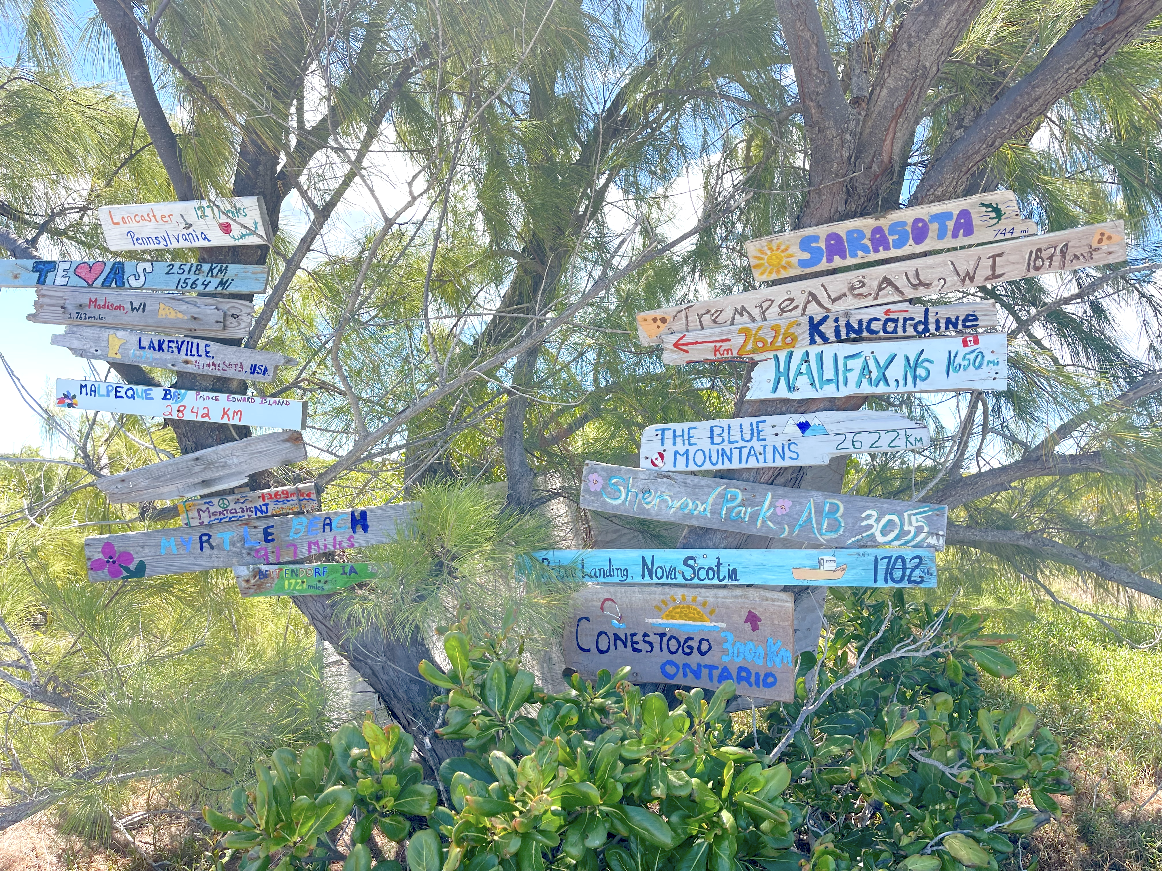 Destination signs guests have made located just up the beach.